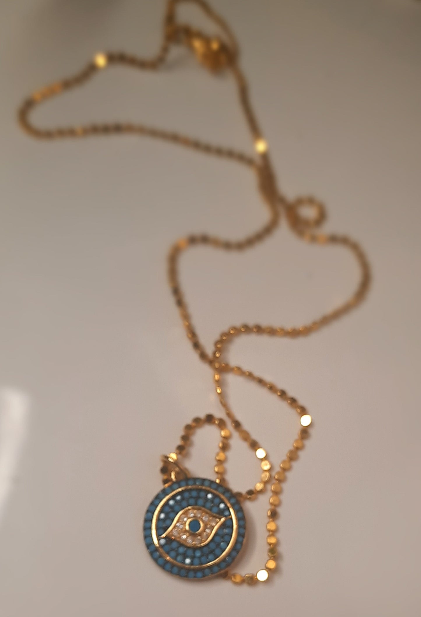 Turquoise eye pendant