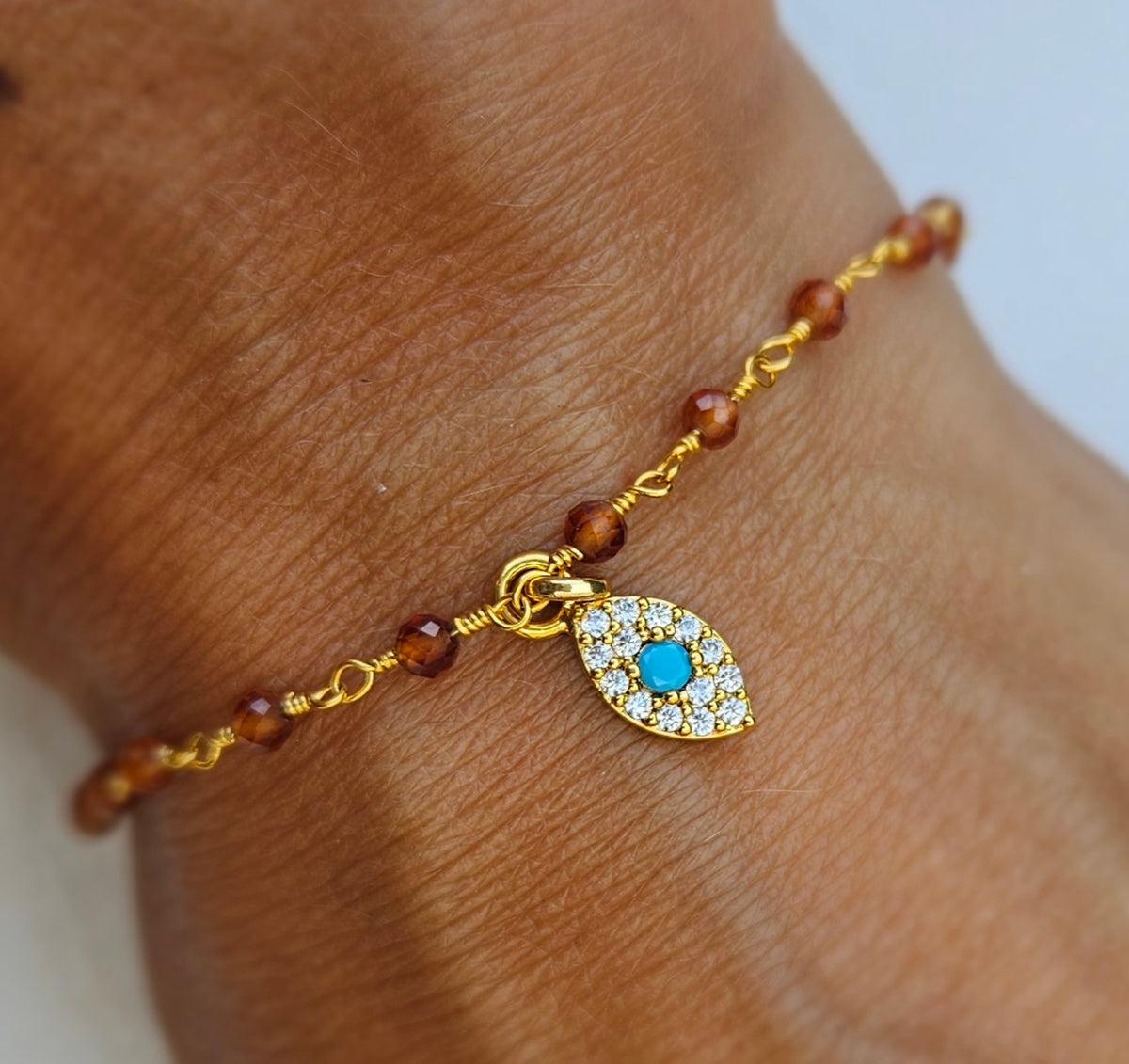 BEADED hessonite evil eye bracelet